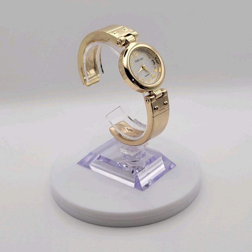 Embassy Womens Gold Tone Bangle Cuff Quartz Watch White Dial Gold Numerals